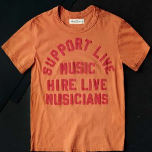 the support live music tee in orange