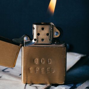 hand stamped godspeed zippo