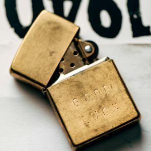 hand stamped good luck zippo