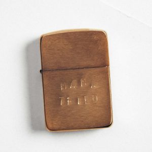 hand stamped mama tried zippo