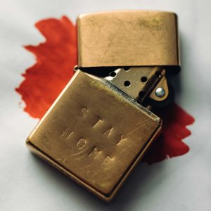 hand stamped stay home zippo